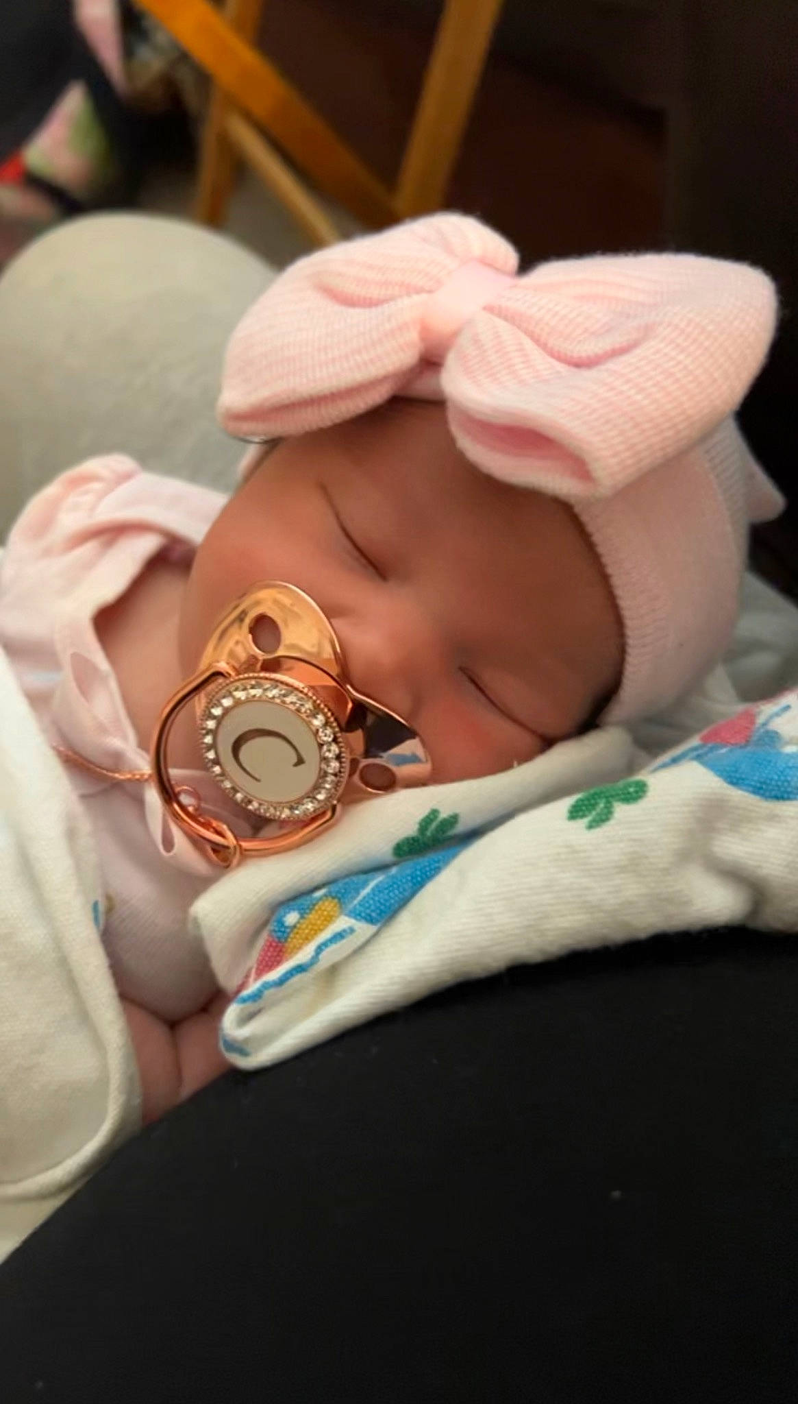 Chanel joined the competition — help win amazing prizes! baby, baby_sleeping, baby_toddler_clothing, comfort, eyelash, fashion_accessory, finger, flesh, gesture, human_body, jewellery, linens, nail, neck, pattern, peach, person, sunglasses, toddler, tradition