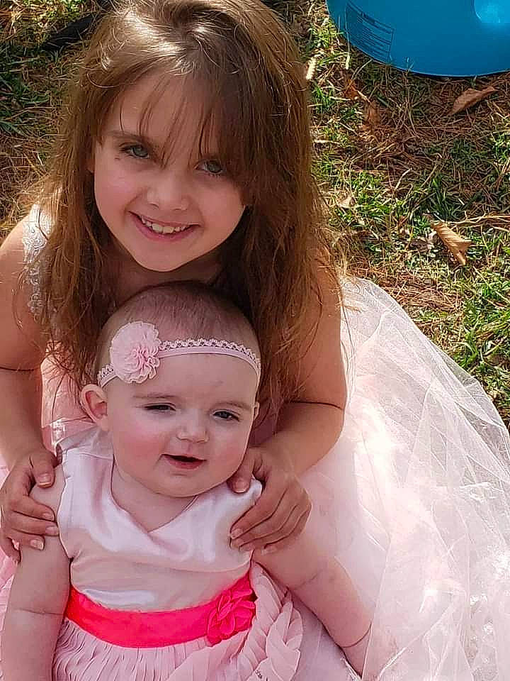 Allyssandra joined the competition — help win amazing prizes! baby, baby_toddler_clothing, cheek, child, dress, eye, eyelash, fun, gesture, grass, hand, happy, headwear, iris, joy, lip, people_in_nature, person, pink, skin