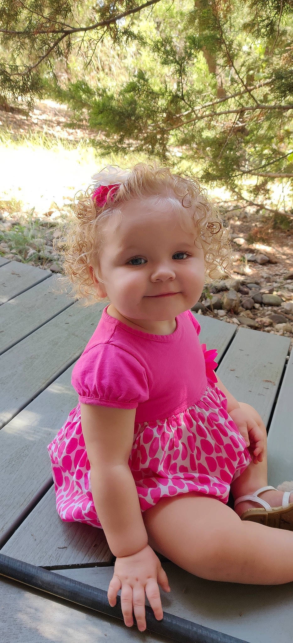 Heather is registered to the contest to win money with this photo: baby, baby_products, baby_toddler_clothing, blond, child, child_model, magenta, pattern, person, pink, play, sitting, skin, smile, summer, toddler