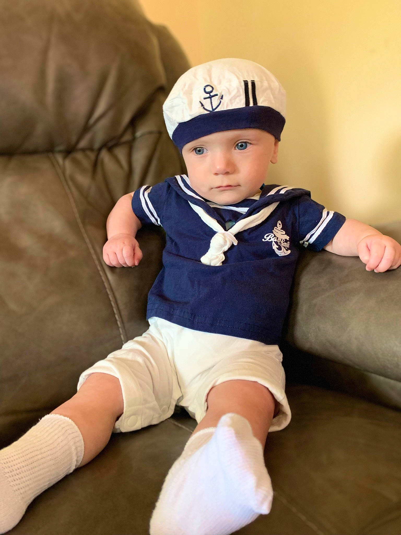 Dawson joined the competition — help win amazing prizes! baby, baby_toddler_clothing, cap, clothing, costume_hat, elbow, eye, face, flash_photography, happy, head, headwear, human_body, human_leg, knee, person, skin, sleeve, sock, t_shirt