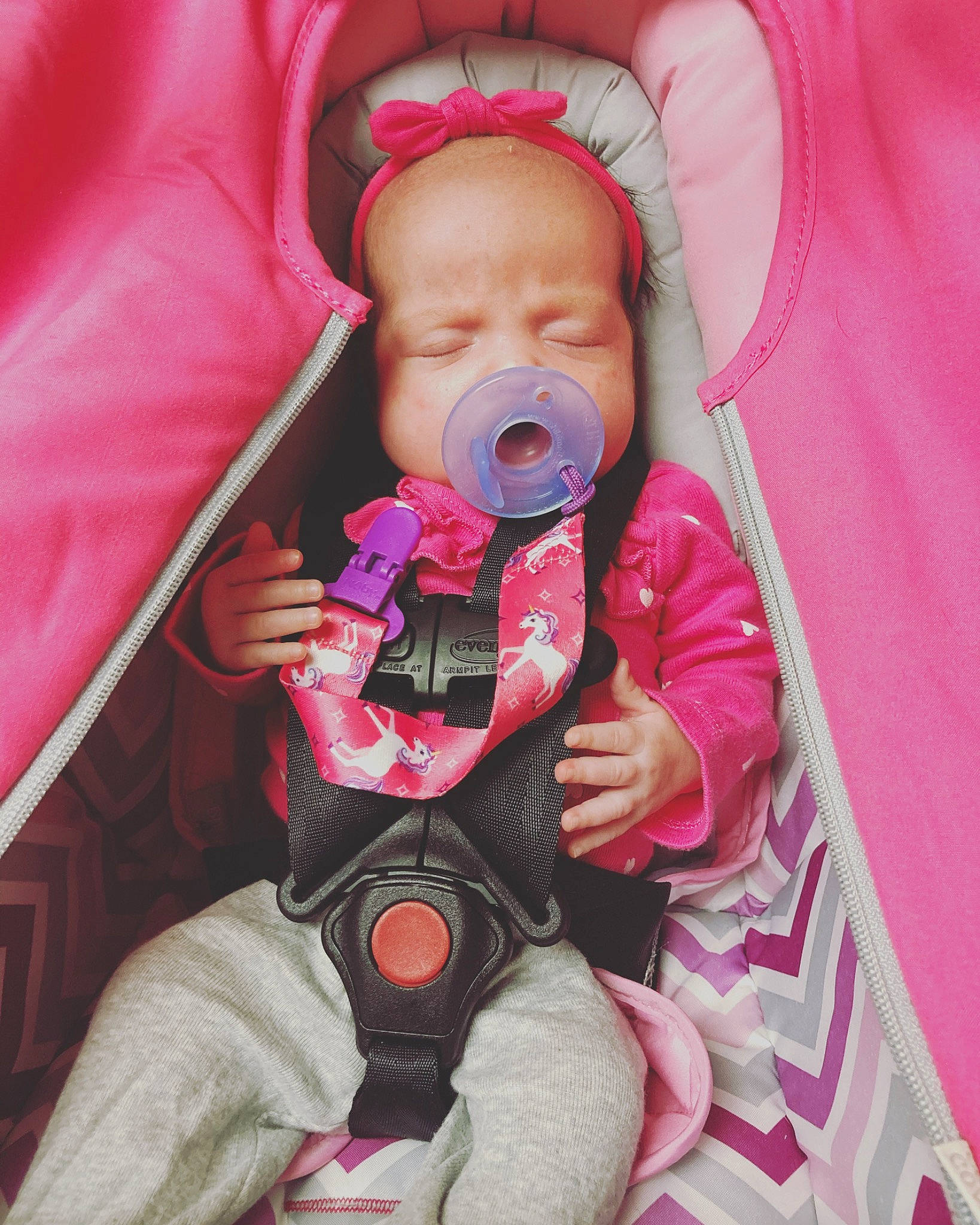 Lakelyn is registered to the contest to win money with this photo: baby, baby_carriage, baby_safety, baby_toddler_clothing, cheek, chin, comfort, eye, head, human_body, jacket, lip, mouth, nose, organ, person, pink, skin, sleeve, thumb