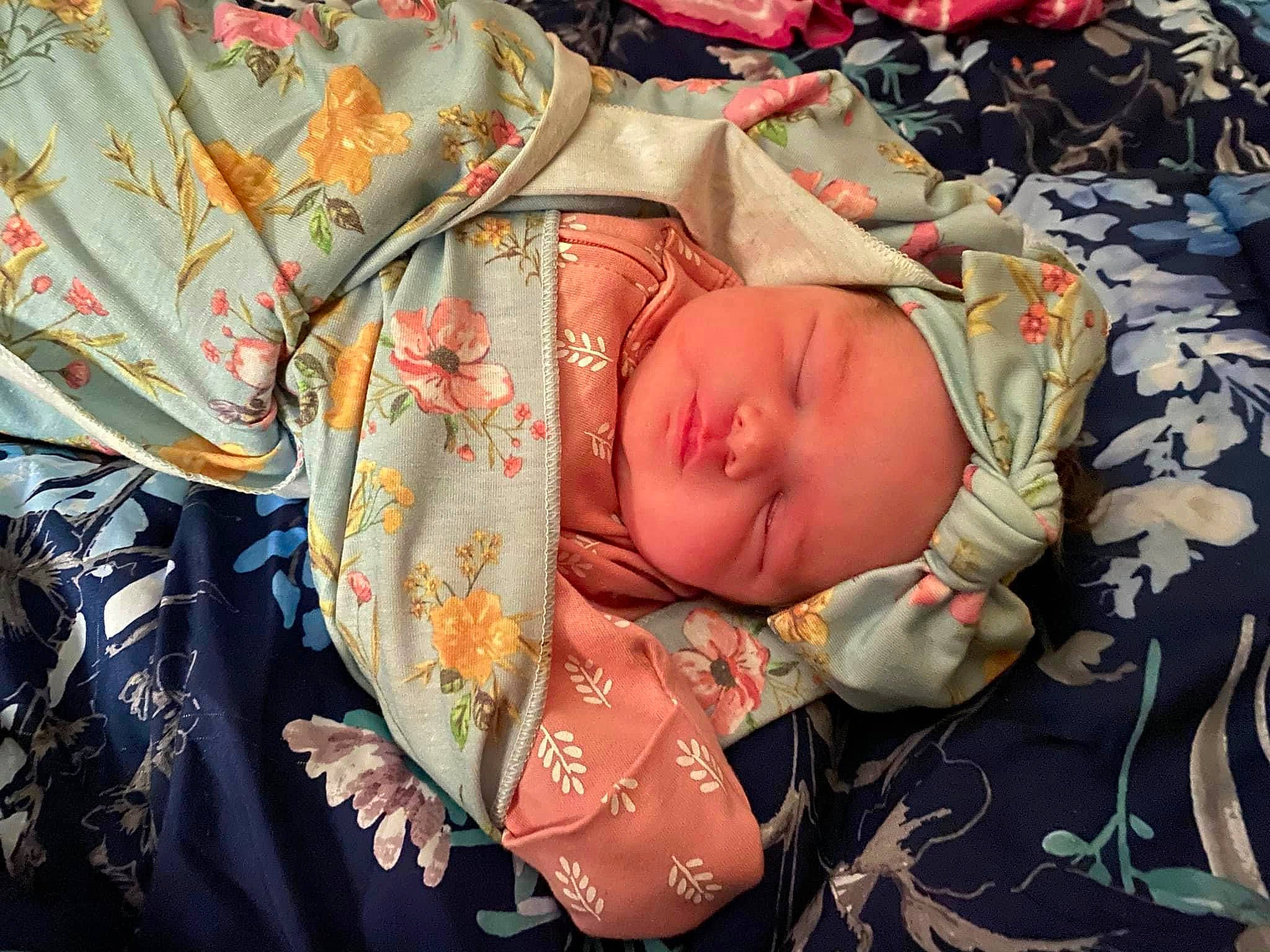 Averi is registered to the contest to win money with this photo: baby, baby_products, baby_sleeping, baby_toddler_clothing, bedtime, cheek, child, comfort, fashion_accessory, flesh, headwear, linens, nap, pattern, peach, person, room, sleep, sleeve, textile