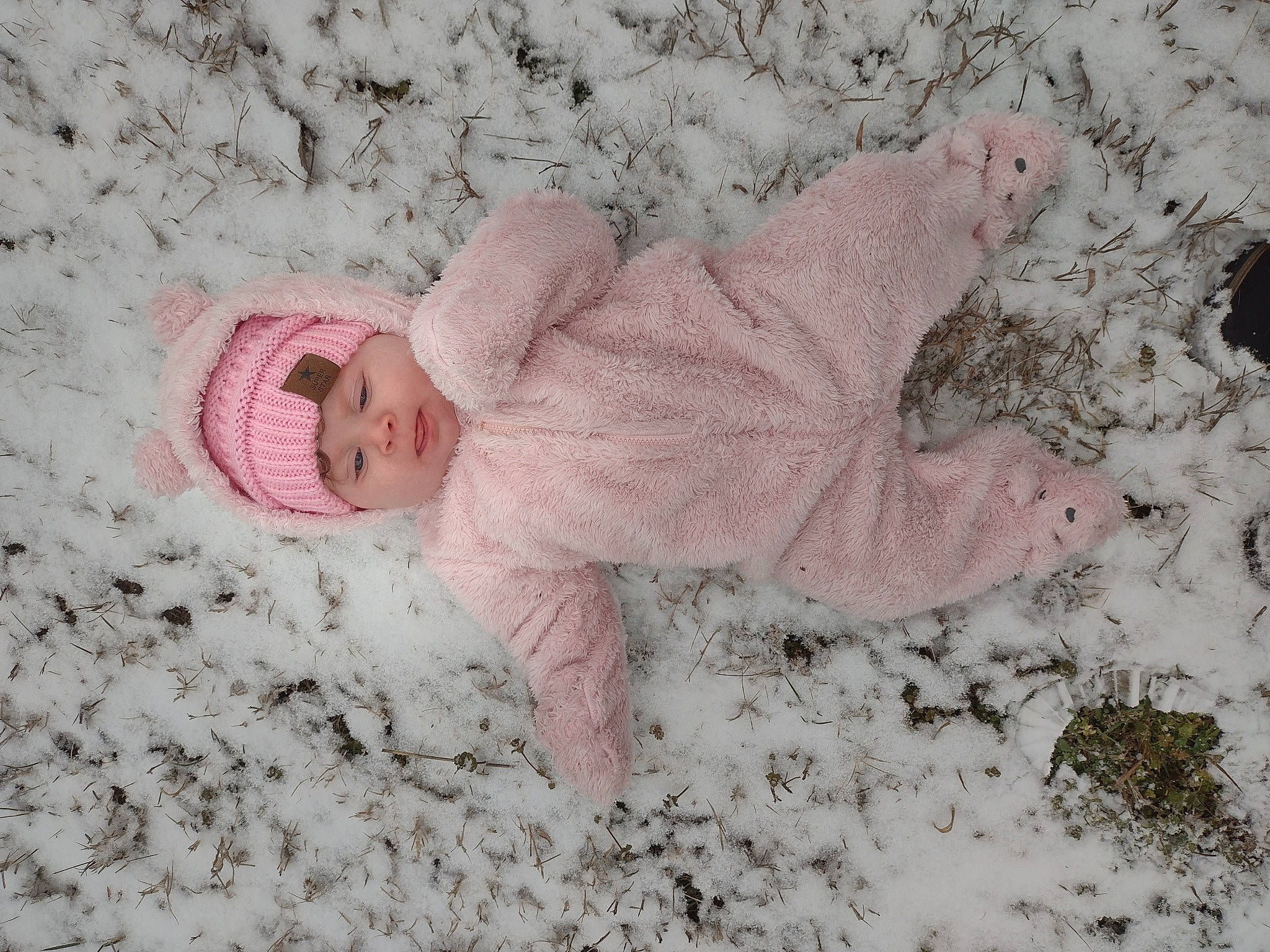 Lailah joined the competition — help win amazing prizes! baby, baby_toddler_clothing, cheek, dress, eye, face, freezing, fur, head, headgear, headwear, knit_cap, linens, pattern, person, pink, sleeve, snow, toddler, tree