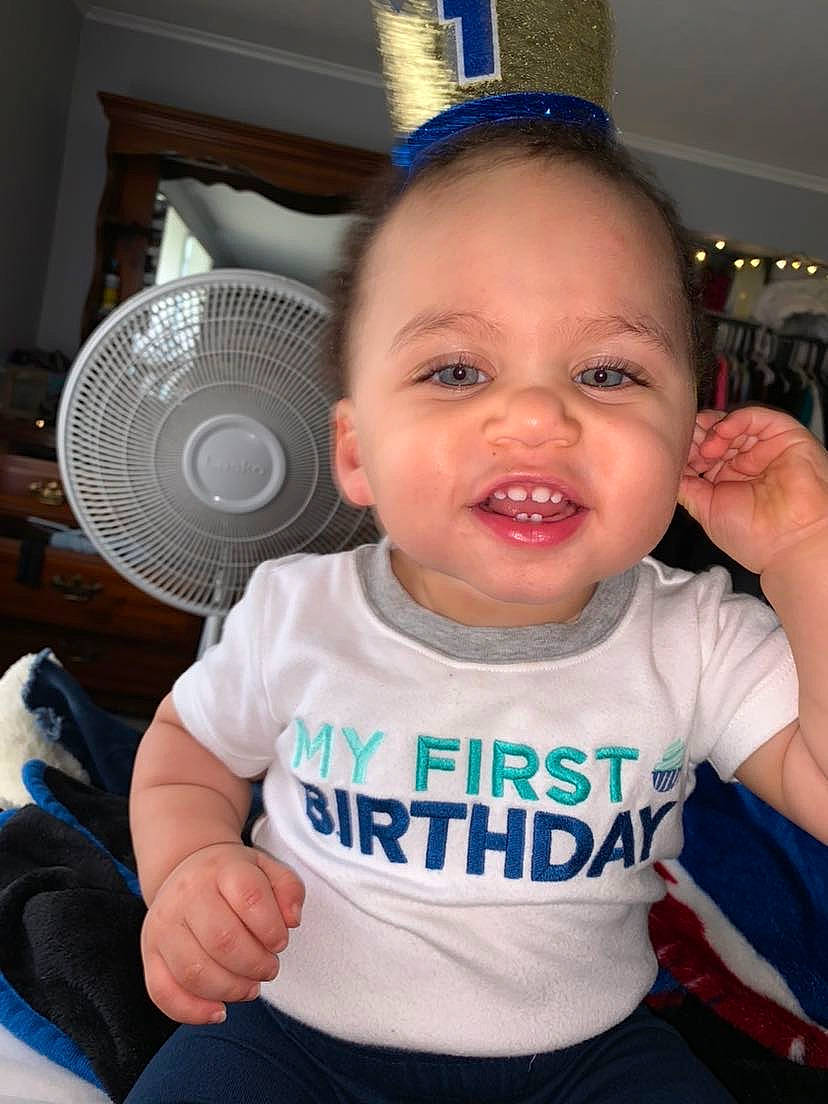 Kyndrick joined the competition — help win amazing prizes! baby, baby_toddler_clothing, blue, cheek, chin, cool, eye, finger, gesture, happy, human_body, iris, lip, mouth, neck, nose, person, skin, sleeve, smile