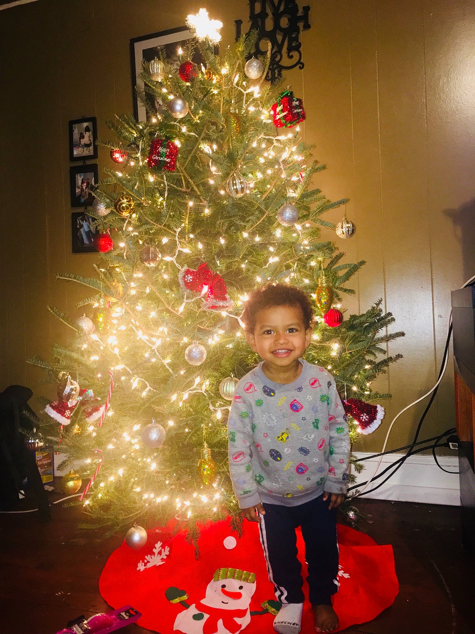 Jaycion joined the competition — help win amazing prizes! christmas, christmas_decoration, christmas_lights, christmas_ornament, christmas_tree, decor, event, fir, holiday, joy, person, toddler, tradition, tree