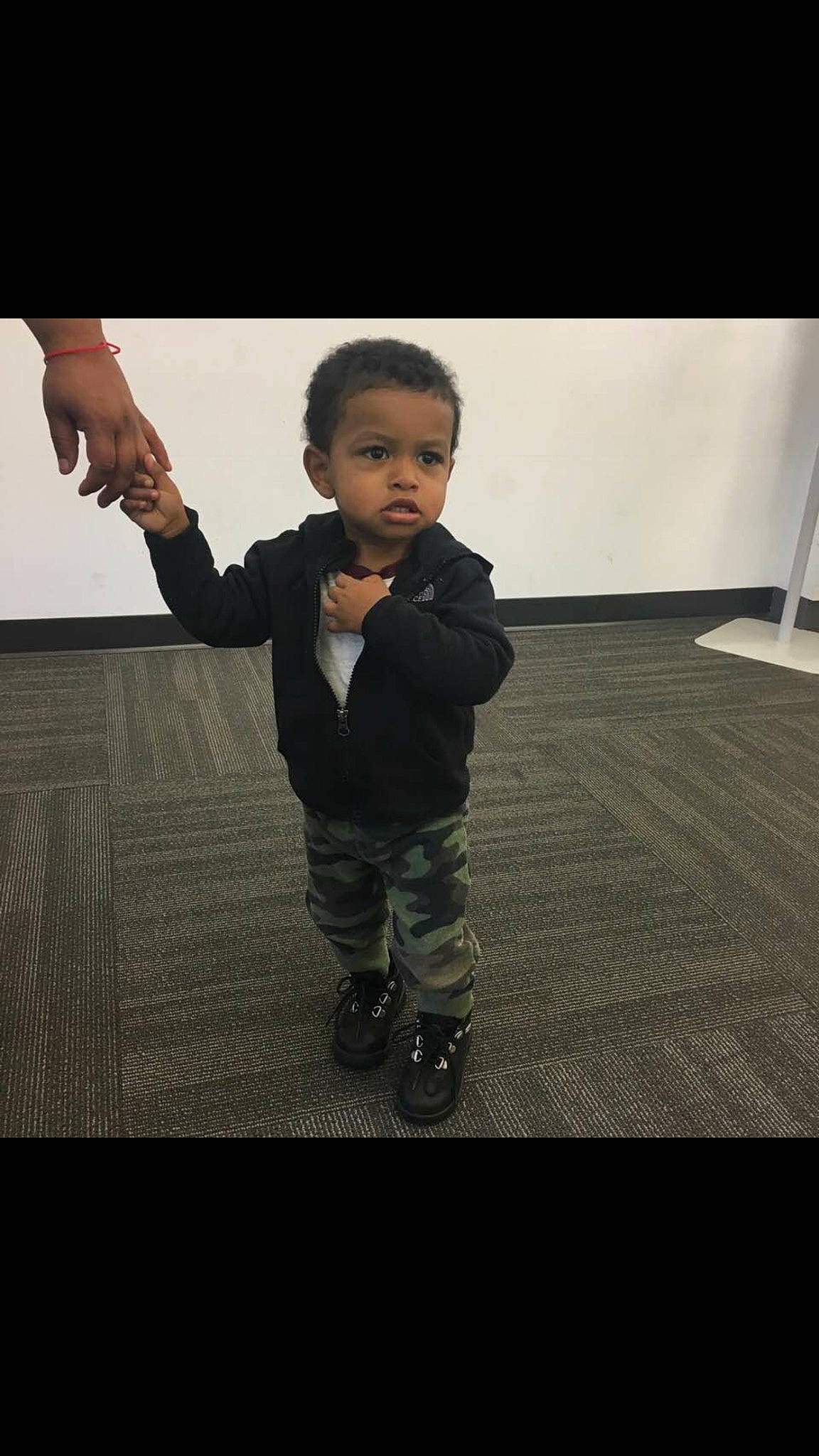 Jaycion is registered to the contest to win money with this photo: arm, black, boy, child, cool, day, fun, gentleman, girl, human, human_behavior, light, outerwear, person, photograph, photography, sitting, snapshot, standing, toddler