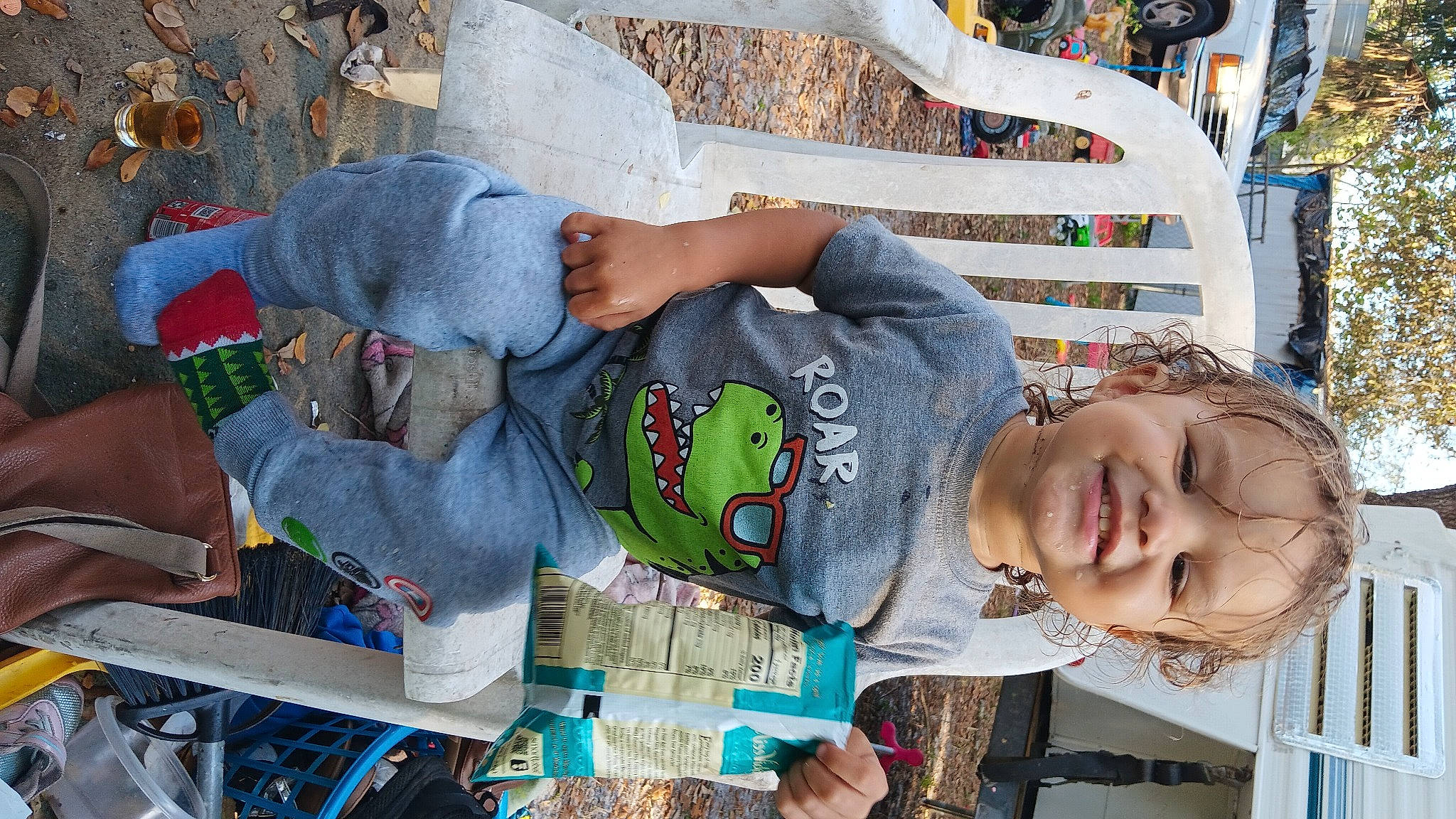 Kaycen is registered to the contest to win money with this photo: adaptation, child, community, daytime, design, fun, happy, hat, human, human_settlement, joy, leisure, person, public_space, red, smile, social_group, temple, textile, toddler