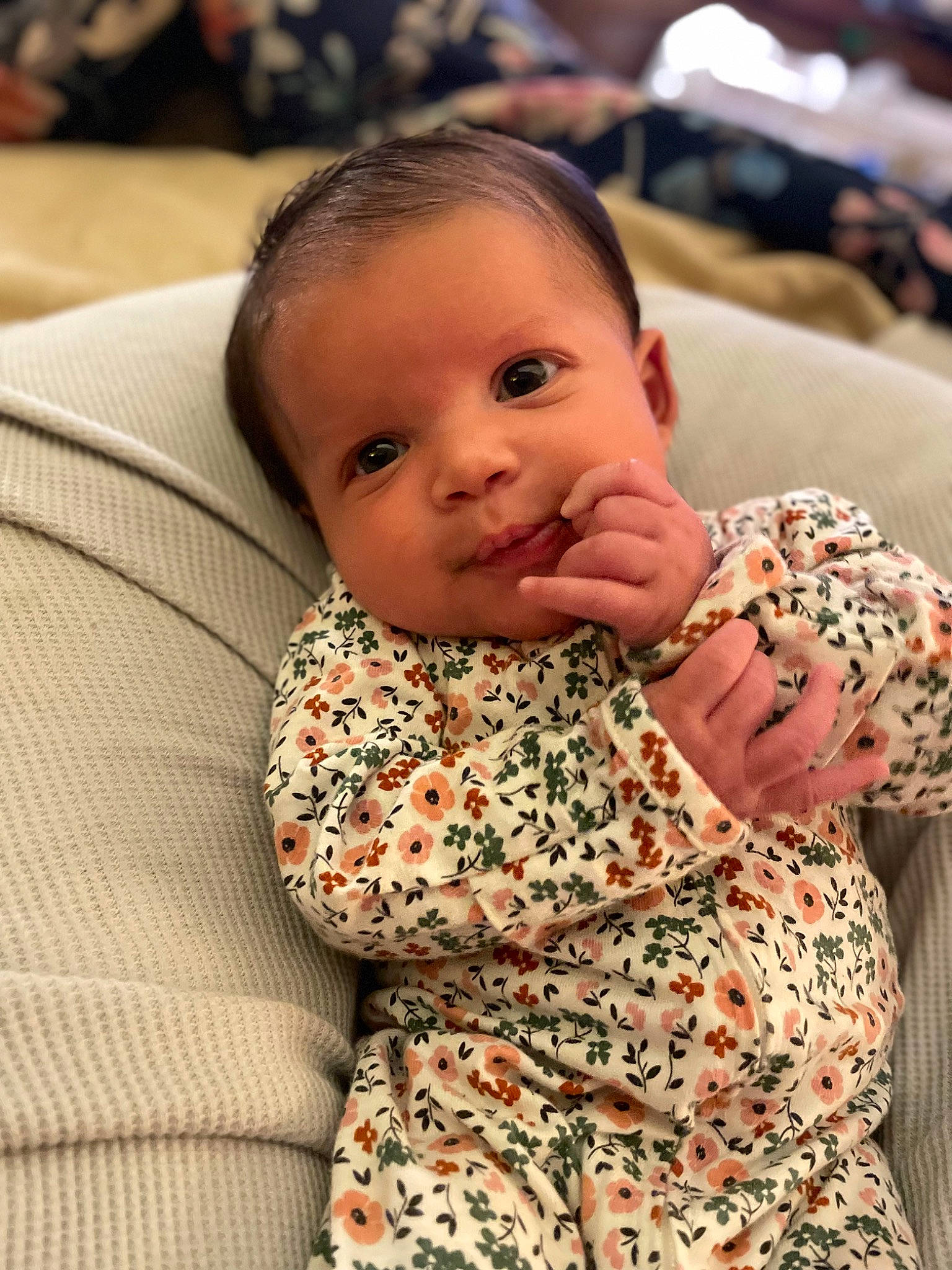 Sianna joined the competition — help win amazing prizes! baby, baby_toddler_clothing, cheek, comfort, couch, face, finger, happy, head, iris, lip, mammal, mouth, neck, nose, person, sitting, skin, sleeve, textile