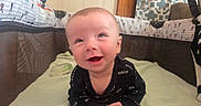 Caspian joined the competition — help win amazing prizes! baby, infant, smile, playpen, blanket, toy, bottle, face, happy, tummy, clothing, indoor, child, cute, head, looking_up, person, home, soft_toy, baby_garment