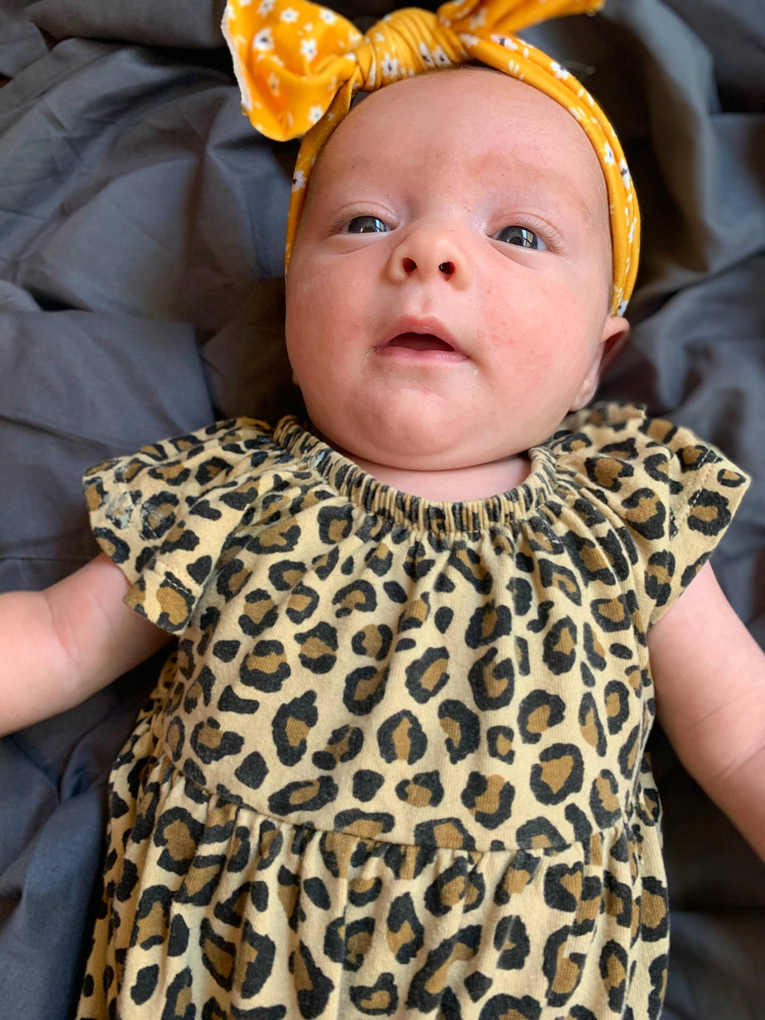 Olivia is registered to the contest to win money with this photo: baby, baby_toddler_clothing, beauty, child, costume_hat, event, eye, happy, headband, headgear, headpiece, jewellery, organ, pattern, person, skin, sleeve, textile, toddler, white