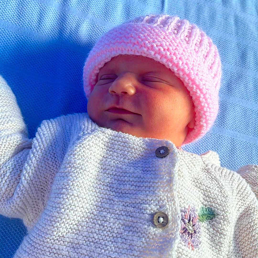 Ivy Rae joined the competition — help win amazing prizes! baby, blue_blanket, buttoned_sweater, child, closeup, cozy, cute, floral_embroidery, infant, knitted_sweater, newborn, outdoor, peaceful, pink_hat, portrait, resting, sleeping, soft_light, texture, warm_clothing