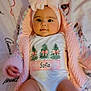 Sofia is registered to the contest to win money with this photo: baby, bed, blanket, bonnet, clothing, face, furniture, hat, head, newborn, person, photography, portrait, quilt, sitting, sleeve, t_shirt, text, towel, toy