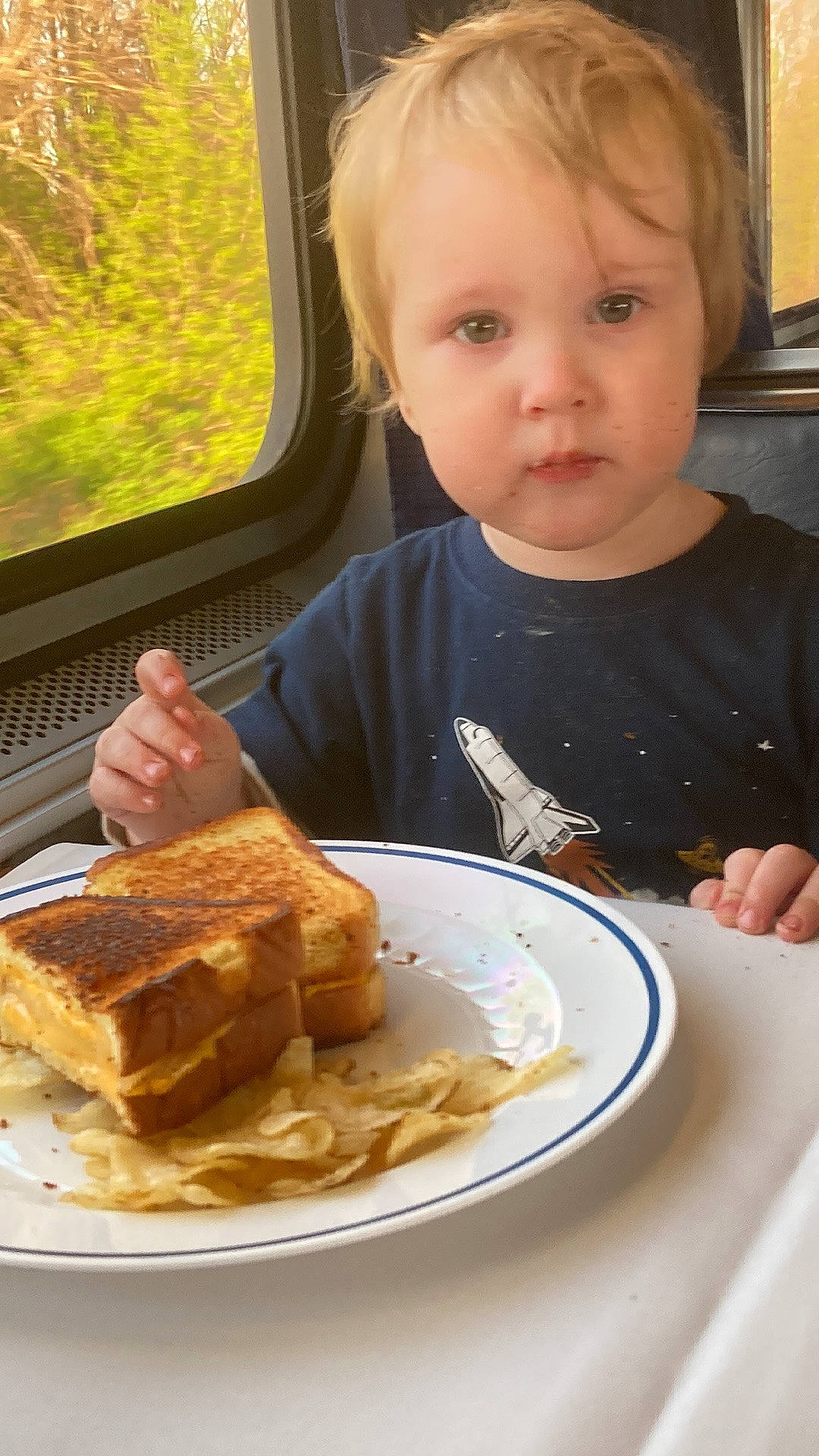 Charlie is registered to the contest to win money with this photo: baked_goods, chair, comfort_food, cuisine, dish, fast_food, food, food_craving, fork, graham_bread, ingredient, junk_food, person, plate, sandwich, sharing, sliced_bread, staple_food, table, tableware