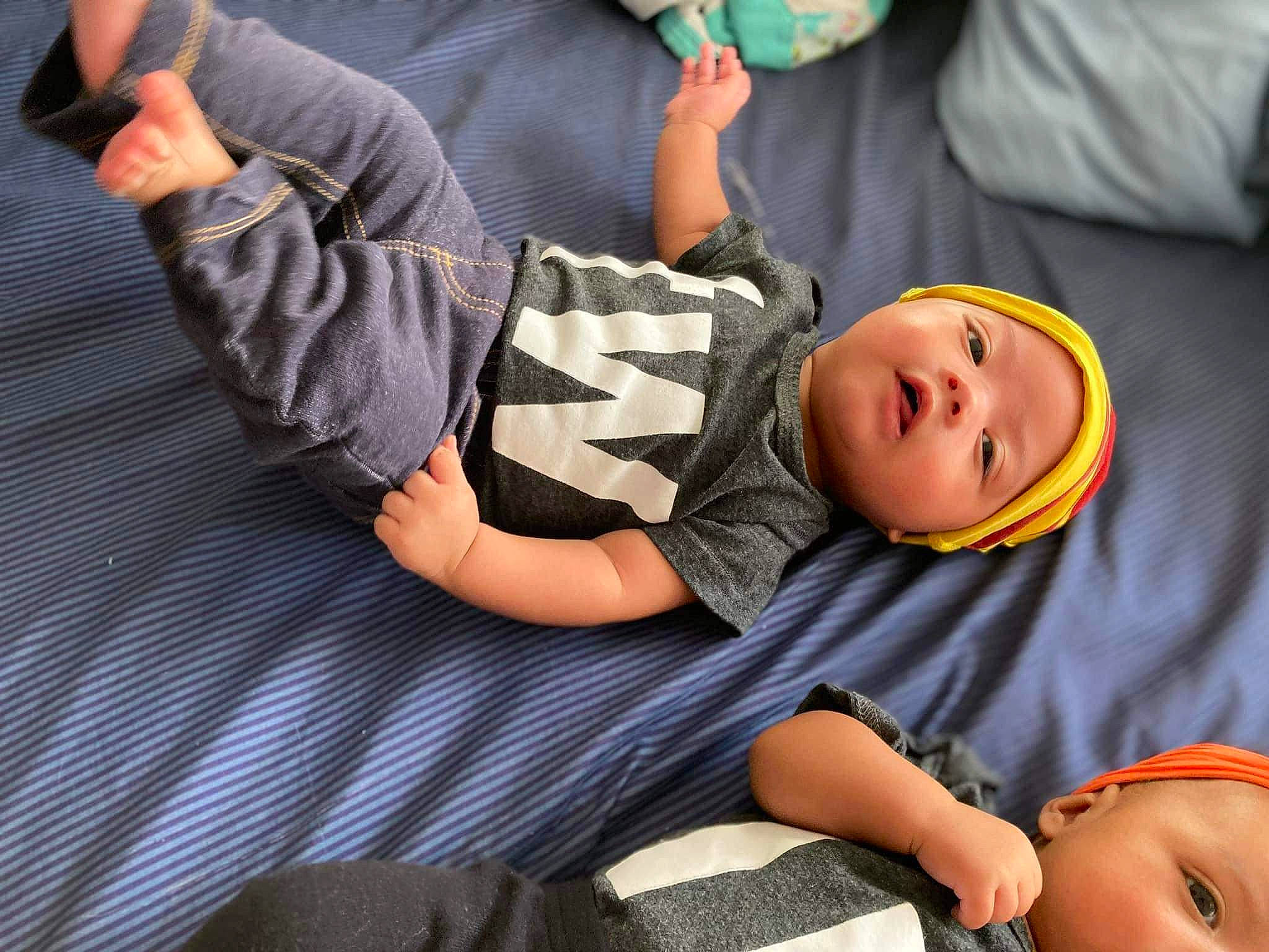 Kyson joined the competition — help win amazing prizes! arm, baby, baby_products, baby_toddler_clothing, child, comfort, elbow, facial_expression, finger, fun, hand, happy, headwear, human, joint, knee, mouth, person, sitting, skin