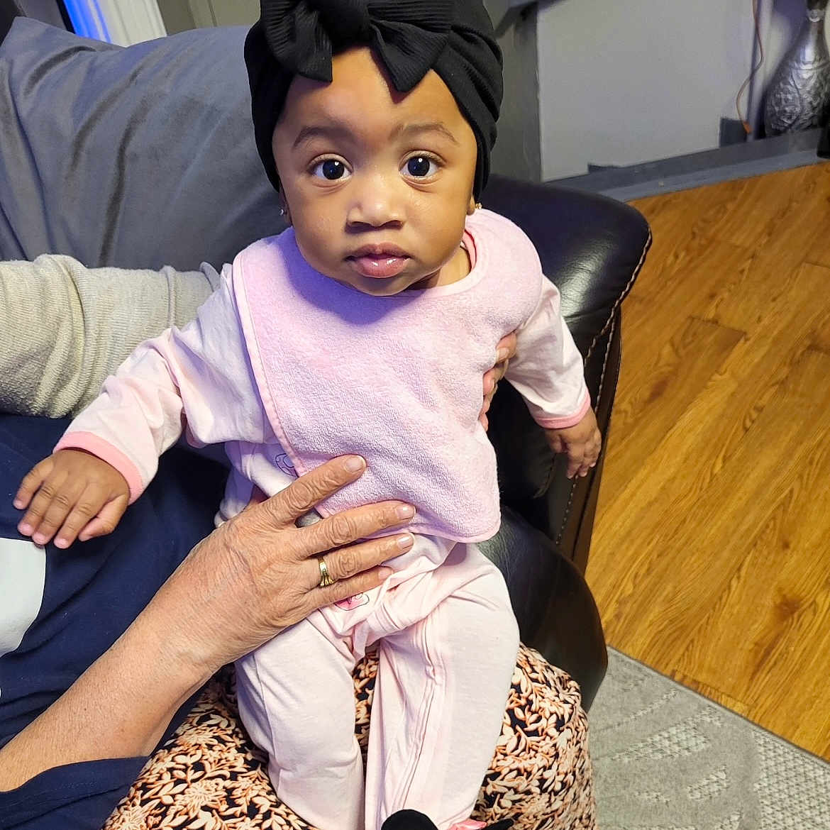 Nayeli joined the competition — help win amazing prizes! baby, chair, clothing, couch, face, footwear, furniture, hardwood, hat, head, indoors, interiordesign, pants, people, person, photography, portrait, shoe, sitting, wood