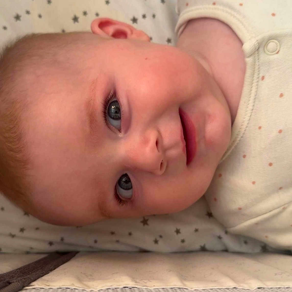 Mara-Jayne joined the competition — help win amazing prizes! baby, babylaughing, bed, face, furniture, happy, head, laughing, newborn, person, photography, portrait, quilt, smile