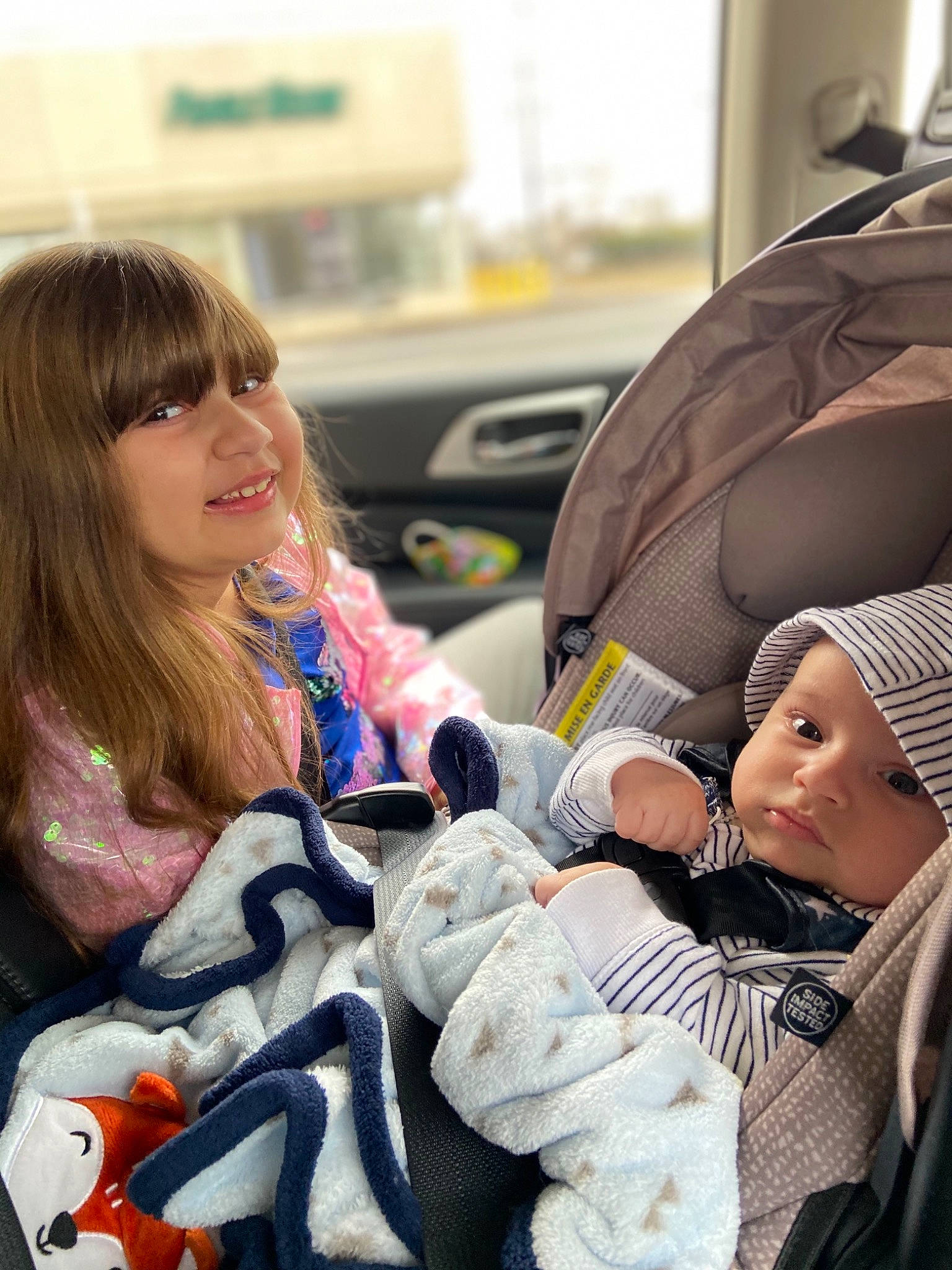 Julissa is registered to the contest to win money with this photo: baby, baby_carriage, baby_products, car_seat, child, comfort, event, family_car, fun, fur, happy, headwear, joy, luxury_vehicle, motor_vehicle, people, person, sitting, skin, smile