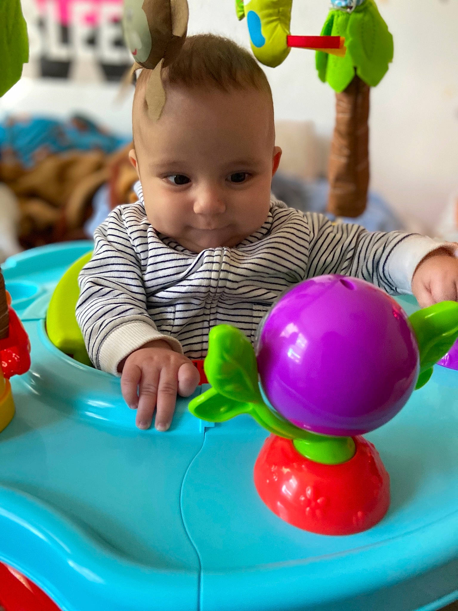 Wyatt joined the competition — help win amazing prizes! baby, baby_playing_with_toys, child, facial_expression, fun, green, happy, head, leisure, organ, person, photograph, product, riding_toy, sharing, skin, snapshot, toddler, toy, vehicle