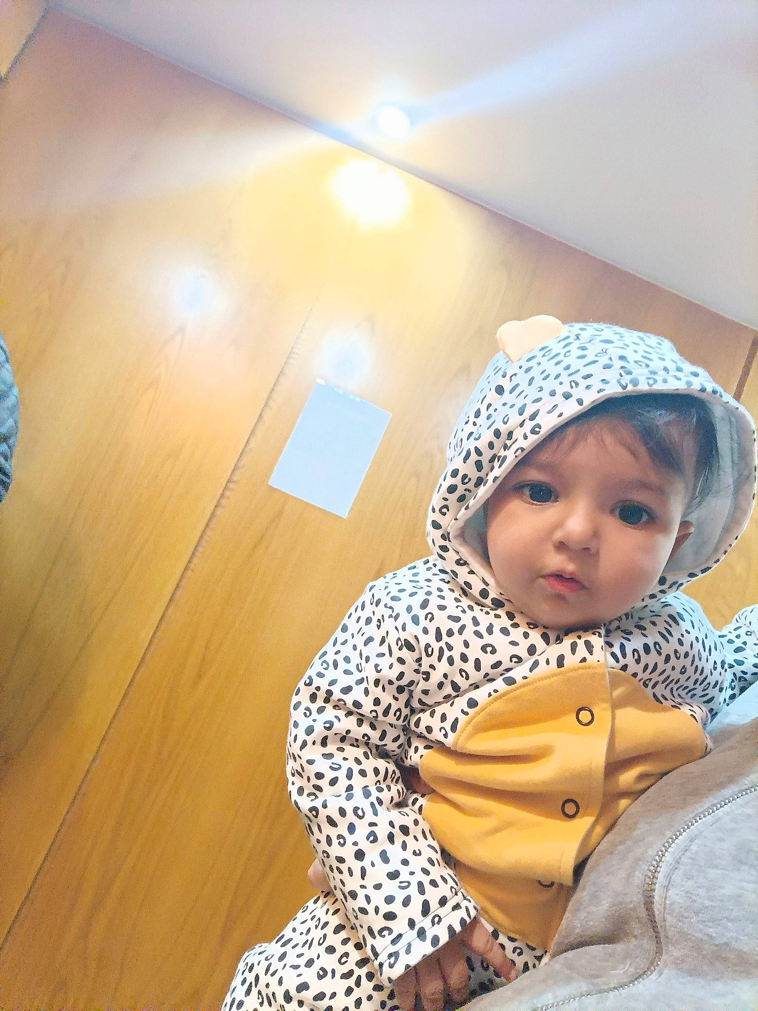 Anaya is registered to the contest to win money with this photo: baby, baby_products, baby_toddler_clothing, beanie, chair, child, comfort, flooring, fun, happy, hardwood, headwear, leisure, pattern, person, room, sitting, sleeve, toddler, varnish