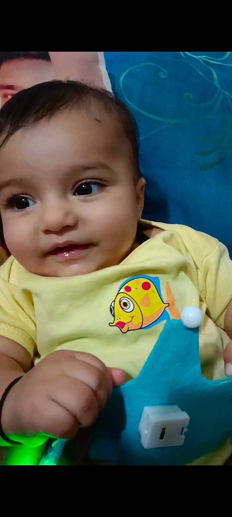 Anaya joined the competition — help win amazing prizes! baby, baby_toddler_clothing, blue, cheek, chin, eye, eyelash, finger, forehead, gesture, green, hand, happy, head, iris, lip, mouth, nose, person, skin