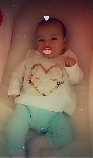 Shayna participe au concours pour gagner de l'argent avec cette photo : baby, baby_toddler_clothing, cheek, face, finger, happy, head, human_body, iris, lip, mouth, neck, nose, person, pink, shoulder, skin, sleeve, smile, stomach