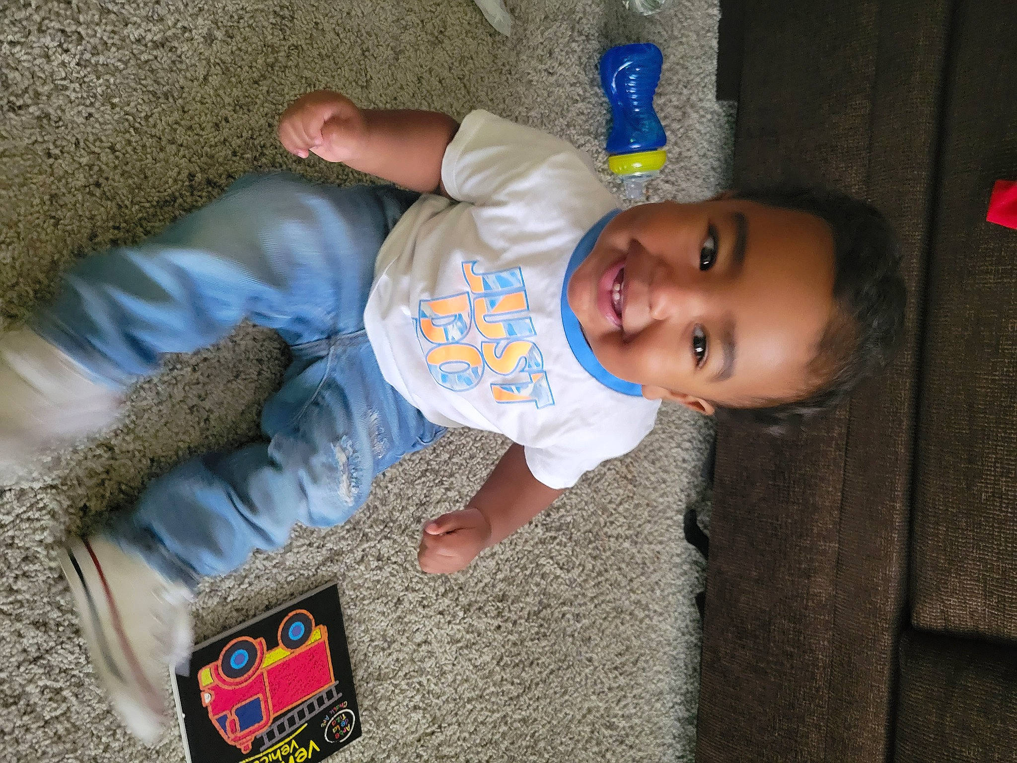 Armani joined the competition — help win amazing prizes! baby, baby_products, baby_toddler_clothing, cheek, child, comfort, electric_blue, finger, flooring, fun, hat, joy, logo, person, play, room, sitting, skin, smile, sock