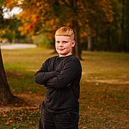 Declan joined the competition — help win amazing prizes! child, boy, portrait, outdoor, autumn, trees, park, fall_colors, smile, short_hair, standing, confidence, nature, grass, bokeh, long_sleeve, casual_clothes, young_person, seasonal, portrait_photography