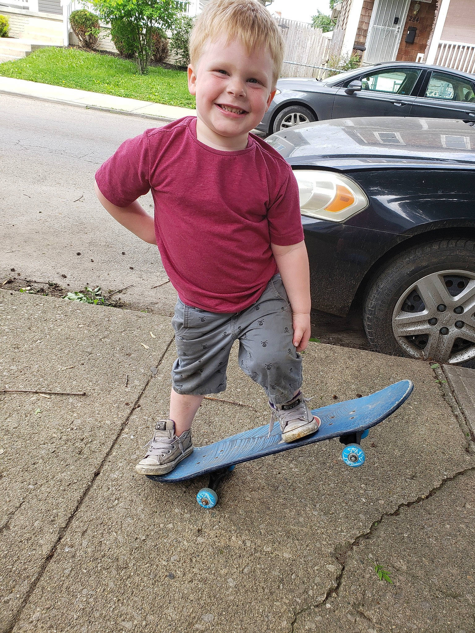 Declan is registered to the contest to win money with this photo: asphalt, auto_part, automotive_exterior, automotive_wheel_system, boardsport, car, child, family_car, joy, longboard, longboarding, person, recreation, skateboard, skateboarder, skateboarding, skateboarding_equipment, smile, sports_equipment, vehicle