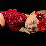 baby, sleeping, red_lace, headband, flower, infant, peaceful, portrait, closeup, cute, soft, black_background, newborn, skin, resting, child, fashion, adorable, face, toddler