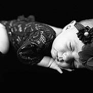 Scarlett Meadow is registered to the contest to win money with this photo: baby, sleeping, black_and_white, lace, headband, flower, infant, portrait, peaceful, closeup, newborn, soft, resting, cute, child, fashion, delicate, young, face, adorable