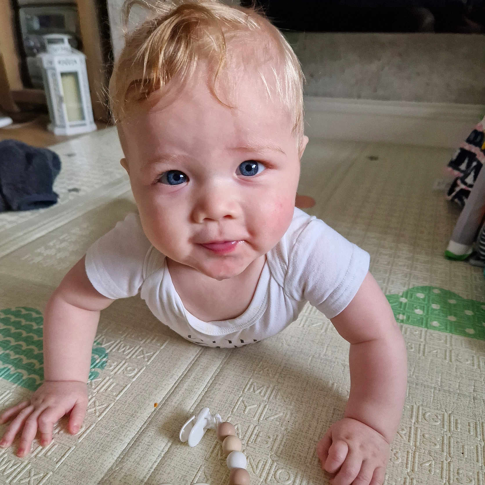 Kyarno is registered to the contest to win money with this photo: accessories, architecture, baby, babycrawling, bodypart, crawling, face, finger, hand, hardwood, head, jewelry, necklace, newborn, person, photography, plywood, portrait, sitting, wood