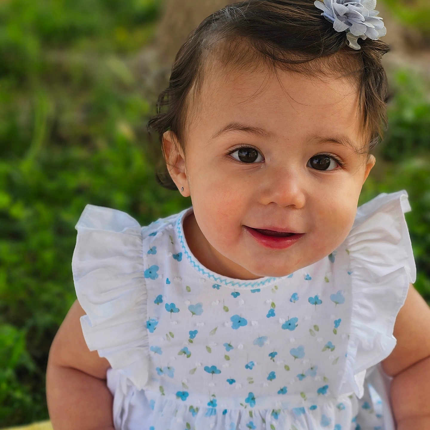 Aria joined the competition — help win amazing prizes! accessories, baby, blouse, bodypart, clothing, dress, face, flower, flowerarrangement, flowerbouquet, grass, happy, head, headband, person, photography, plant, portrait, sitting, smile