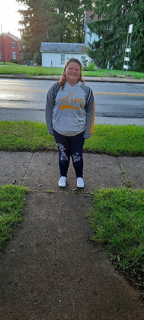 Maddilynn joined the competition — help win amazing prizes! asphalt, clothing, denim, electric_blue, fun, grass, human_leg, joy, knee, leg, leisure, outerwear, pedestrian, person, plant, recreation, road, road_surface, sidewalk, t_shirt