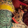 Millienlola is registered to the contest to win money with this photo: art, carmine, comfort, fashion_accessory, felidae, flooring, fur, human_leg, linens, magenta, motif, pattern, room, sleeve, textile, thigh, tradition, visual_arts, woven_fabric