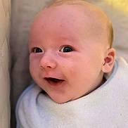 Carter-Jack is registered to the contest to win money with this photo: baby, infant, smile, face, close_up, blanket, wrapped, cute, happy, newborn, skin, head, eyes, mouth, ear, soft_light, portrait, indoors, warm, child