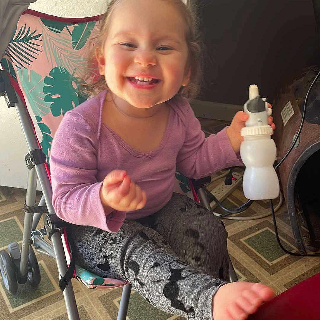 Camille is registered to the contest to win money with this photo: architecture, bodypart, building, cream, cutlery, dessert, face, finger, food, furniture, hand, head, icecream, outdoors, person, photography, portrait, shelter, spoon, table