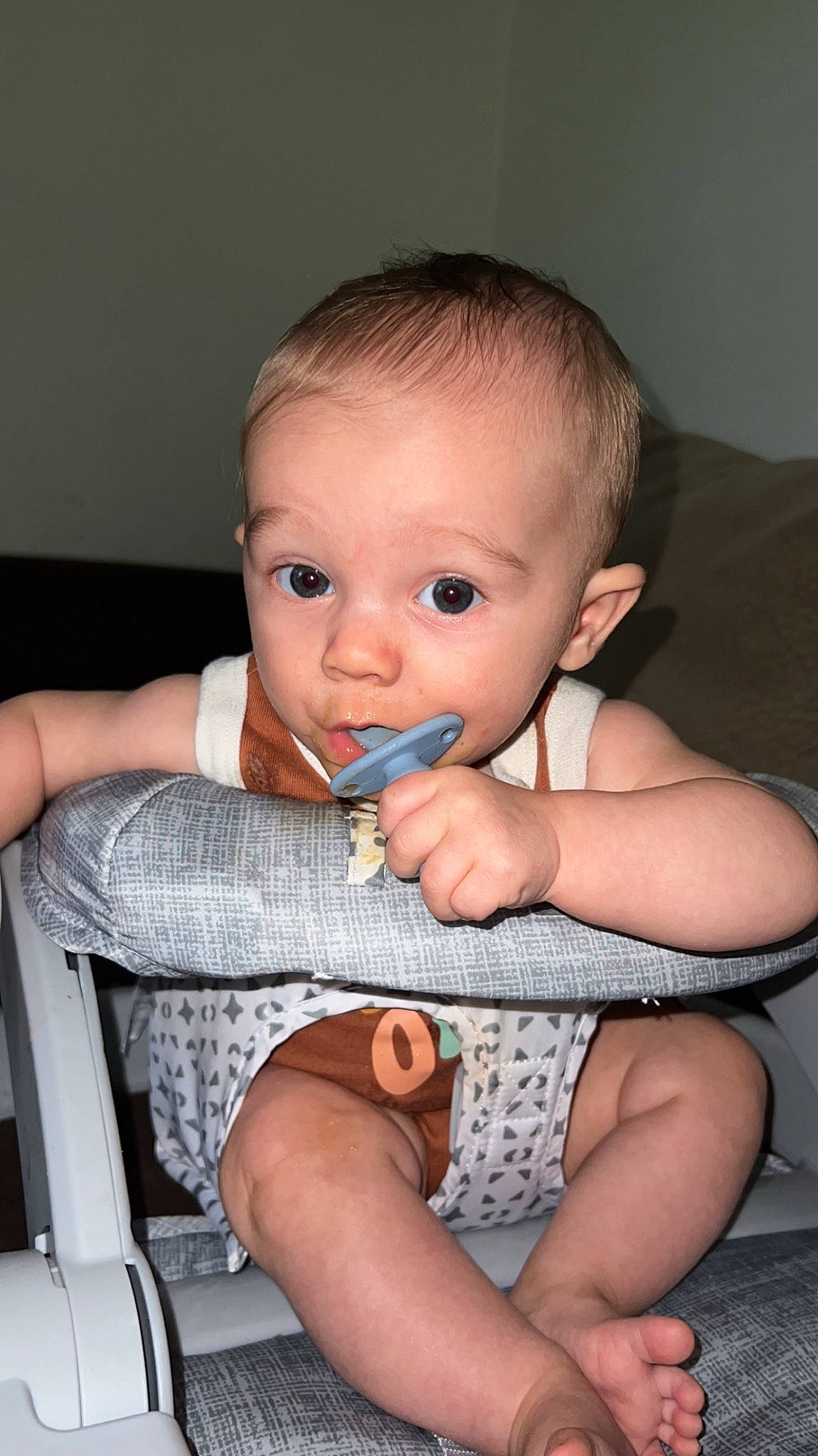 Kameron is registered to the contest to win money with this photo: baby, baby_toddler_clothing, chair, cheek, chin, comfort, eyebrow, eyelash, finger, iris, joint, leg, lip, mouth, muscle, neck, nose, person, skin, thumb