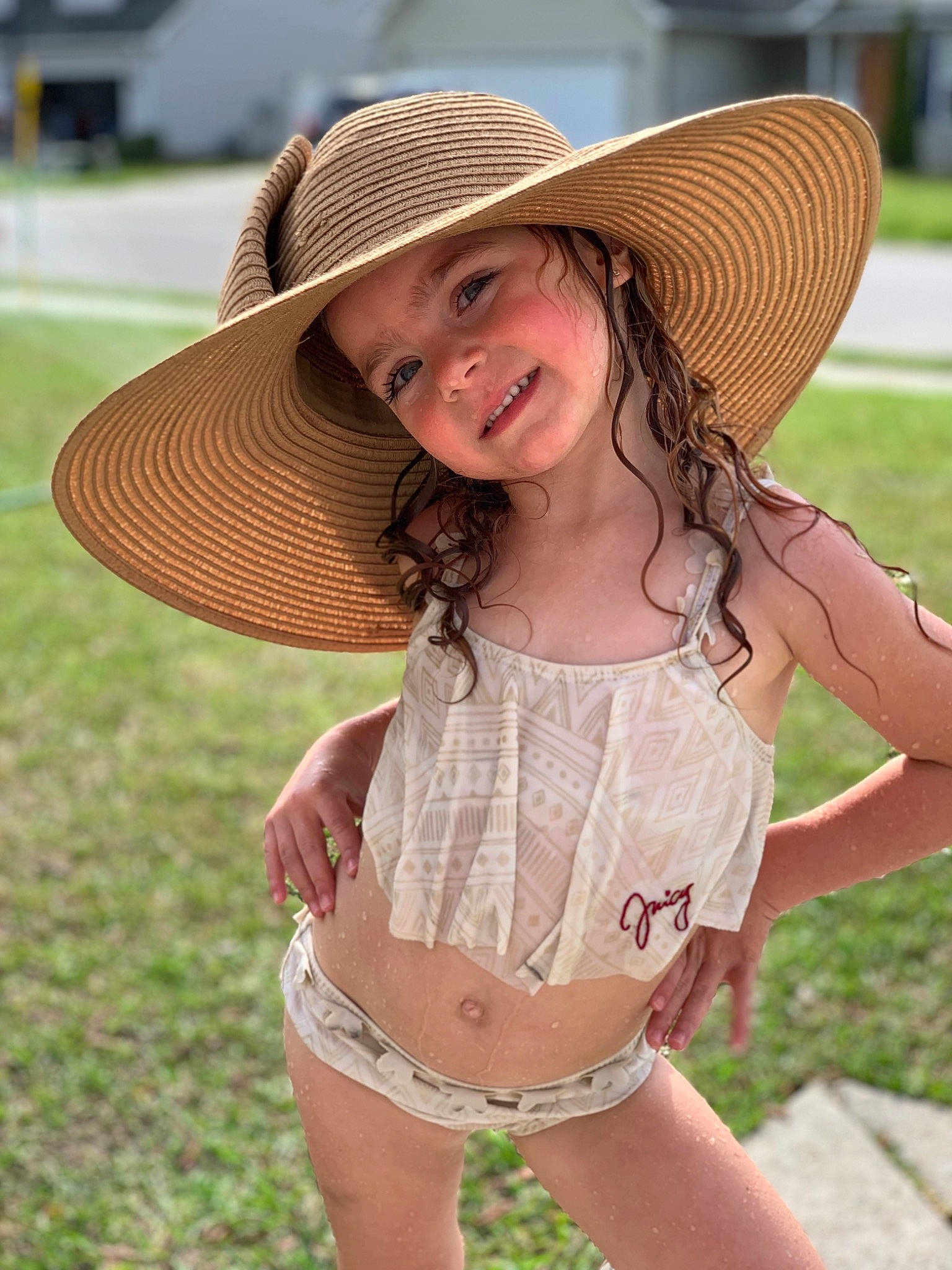 Calina is registered to the contest to win money with this photo: beige, child, child_model, clothing, cowboy_hat, fashion_accessory, fawn, fun, grass, hat, headgear, headwear, joy, person, photography, skin, smile, sombrero, summer, sun_hat