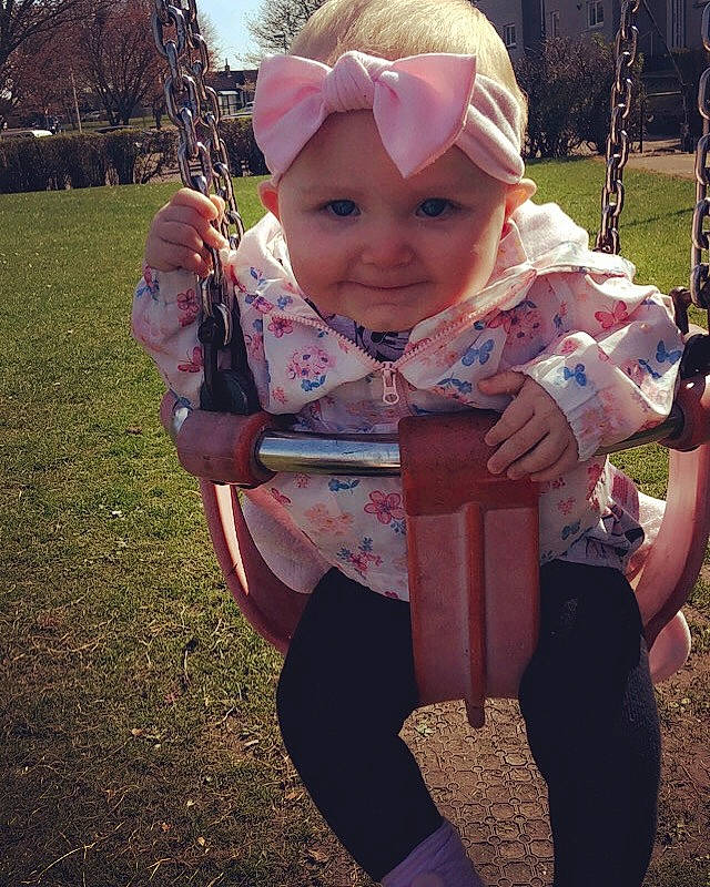 Esmee is registered to the contest to win money with this photo: baby, child, ear, happy, joy, person, plant, play, smile, swing, toddler