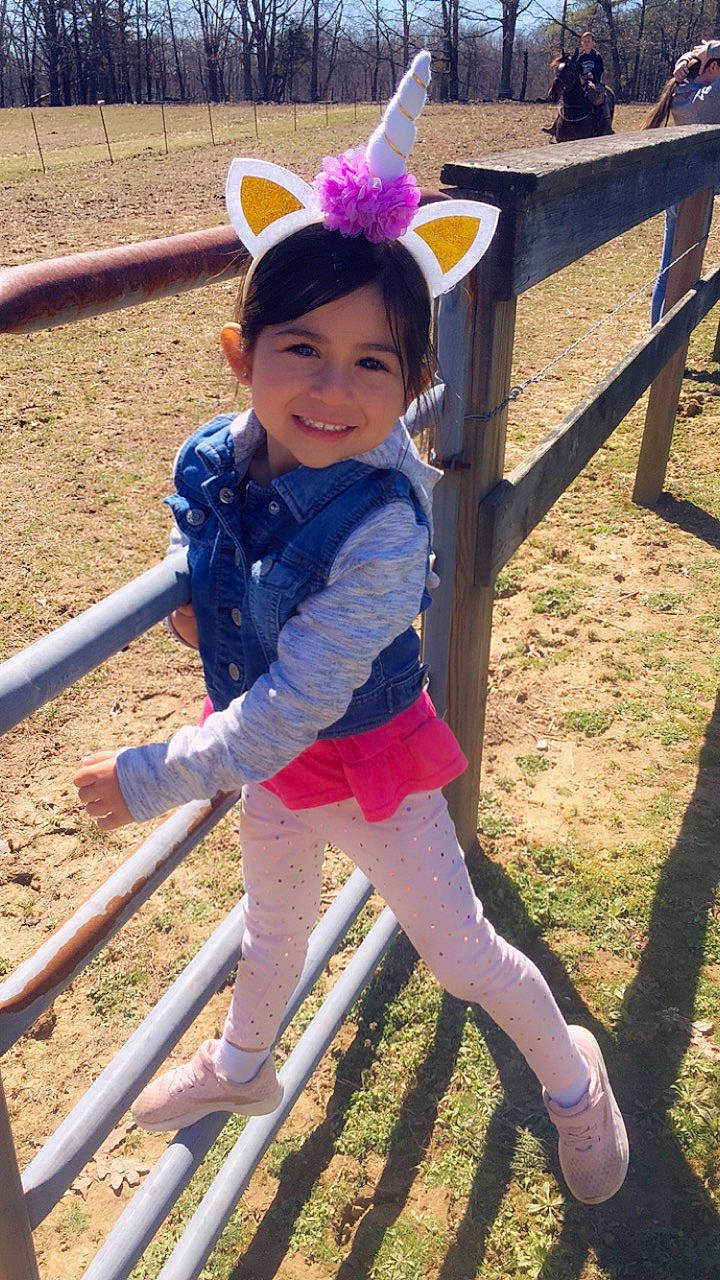 Charliee is registered to the contest to win money with this photo: child, ear, fawn, joy, leg, person, plant, play, playground, public_space, recreation, smile, tights, toddler