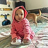 Kaileeanna joined the competition — help win amazing prizes! baby, child, pink_hoodie, white_socks, bed, dog, indoor, portrait, curious, sitting, wall_art, superhero, poster, cozy, casual, home, person, cute, infant, soft_lighting