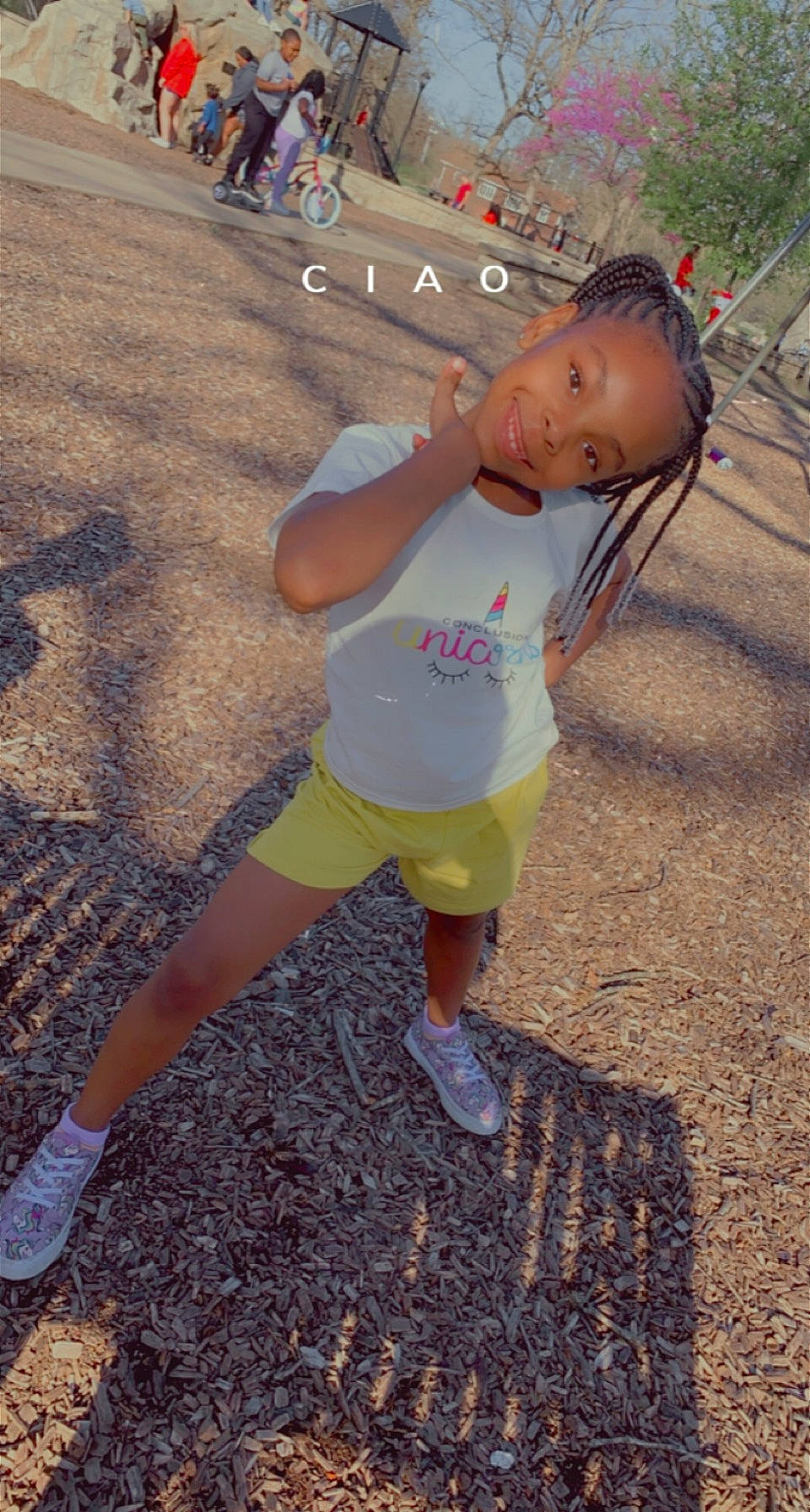Gabrielle is registered to the contest to win money with this photo: child, eye, face, foot, fun, grass, hair, happy, head, human_leg, joy, leisure, person, recreation, sandal, shorts, sneakers, soil, t_shirt, thigh