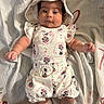 Victoria joined the competition — help win amazing prizes! baby, infant, child, person, clothing, hat, blanket, pattern, floral, cute, smile, socks, hand, lying_down, indoors, fabric, soft, comfortable, adorable, portrait