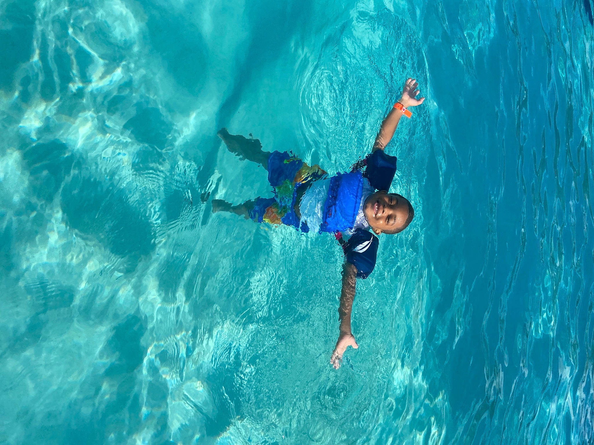 Brent is registered to the contest to win money with this photo: adventure, aqua, azure, electric_blue, extreme_sport, fun, happy, individual_sports, joy, leisure, lifejacket, ocean, person, personal_protective_equipment, recreation, sea, sky, sports, vacation, water