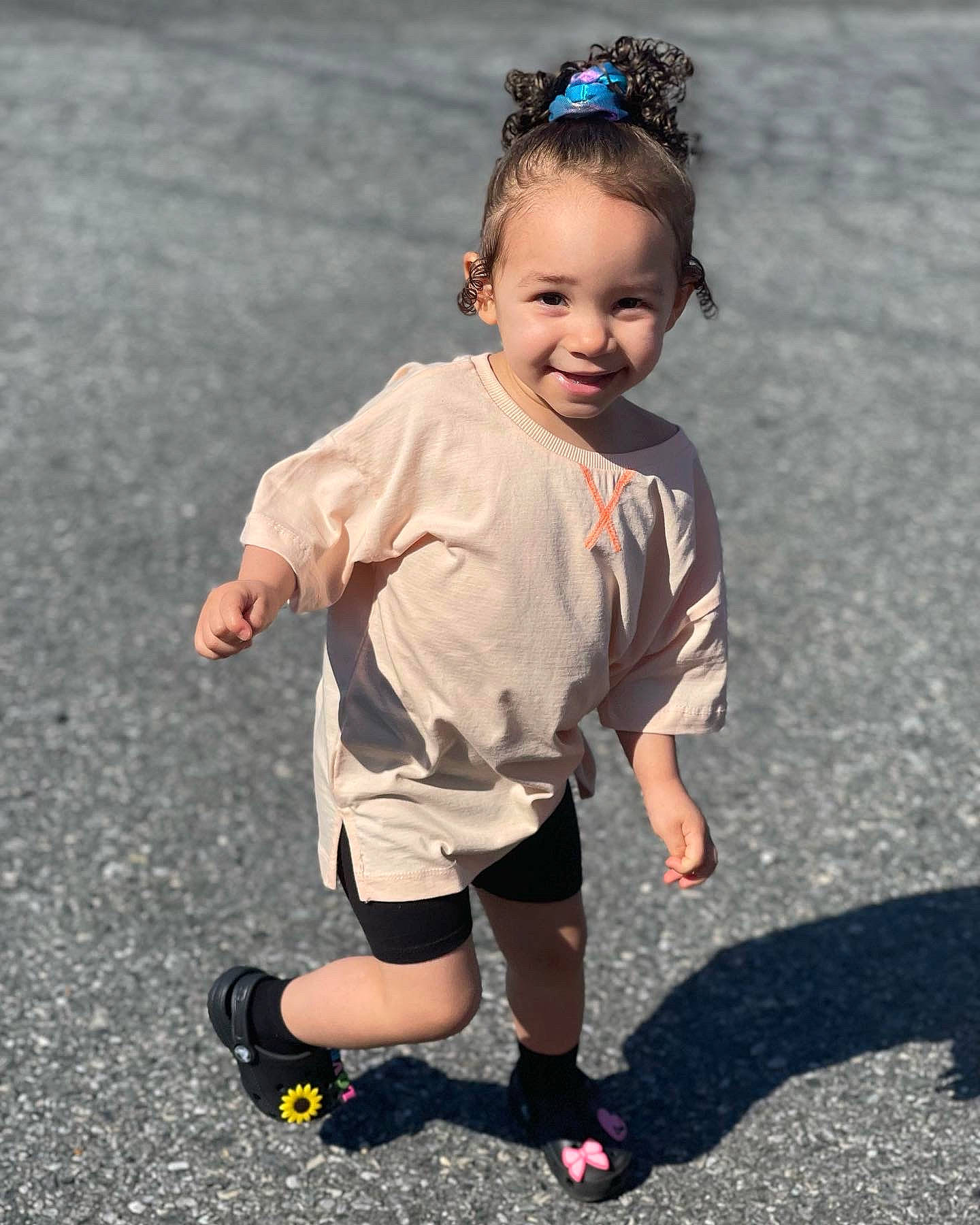 Leyani joined the competition — help win amazing prizes! asphalt, baby_toddler_clothing, child, eye, fashion_accessory, fun, gesture, grass, happy, headband, human_leg, jewellery, joy, pattern, person, recreation, running, sleeve, smile, sneakers