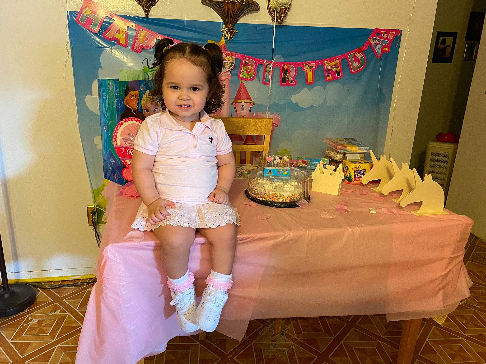 Zalayah is registered to the contest to win money with this photo: birthday, child, furniture, joy, party, person, pink, room, table, toddler
