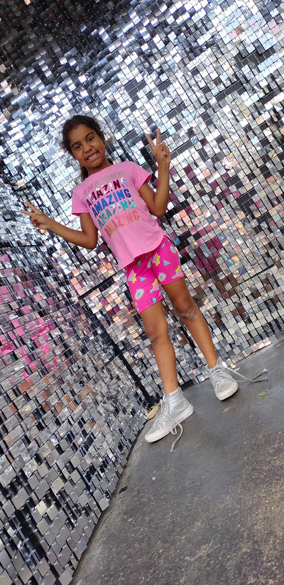 Chloe joined the competition — help win amazing prizes! calf, city, entertainment, event, flash_photography, foot, fun, happy, human_leg, joy, leg, leisure, magenta, pattern, performing_arts, person, pink, sandal, shorts, t_shirt