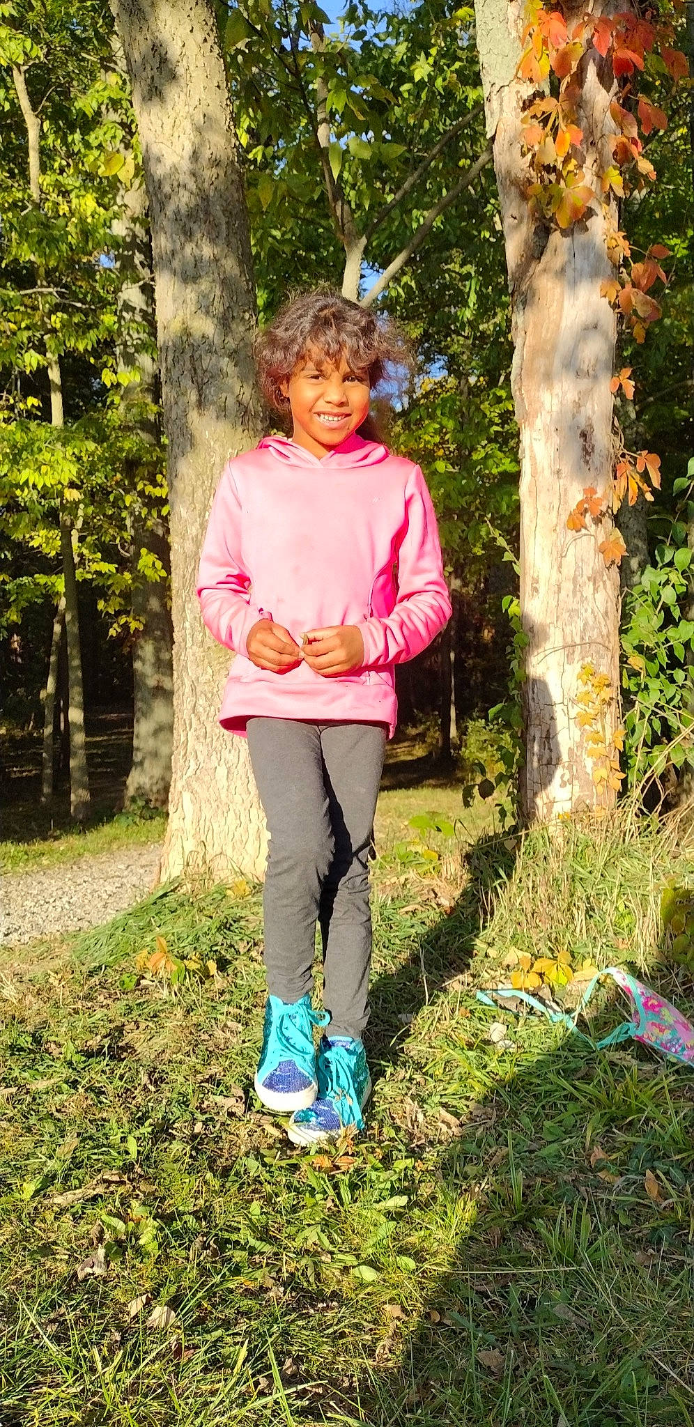 Chloe joined the competition — help win amazing prizes! child, electric_blue, forest, fun, grass, happy, joy, leggings, leisure, magenta, natural_landscape, pattern, people_in_nature, person, plant, recreation, sleeve, t_shirt, tree, trunk