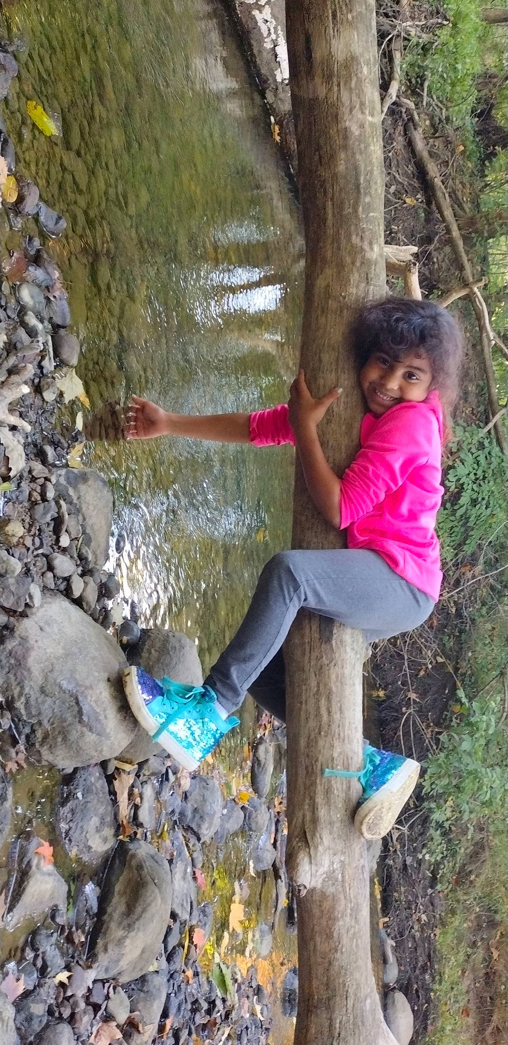 Chloe joined the competition — help win amazing prizes! bedrock, boot, botany, forest, fun, grass, happy, joy, jungle, leisure, people_in_nature, person, plant, recreation, rock, spring, stream, thigh, tree, trunk