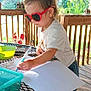 Freya joined the competition — help win amazing prizes! toddler, child, sunglasses, red_sunglasses, drawing, coloring, marker, porch, wooden_railing, outdoor, table, plastic_bowl, shorts, tshirt, footwear, crocs, daylight, summer, garden_decor, playful